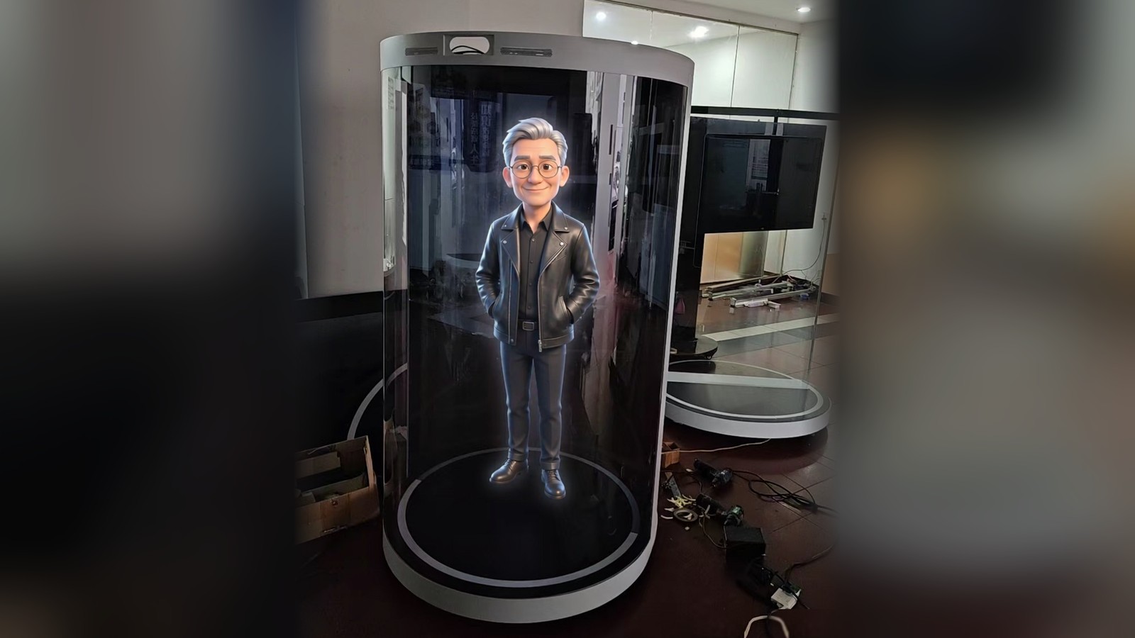 75-inch miniLED hologram stage photographed on site: a cartoon panda character projected inside the half-cylinder glass enclosure